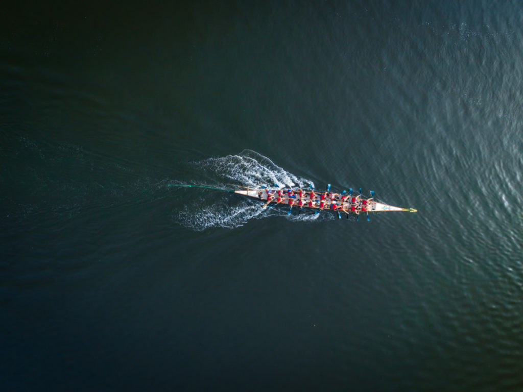 sea, rowing boat, oars, wake, Team work, sport, bird's eye view, aerial image, drone photography, royalty free