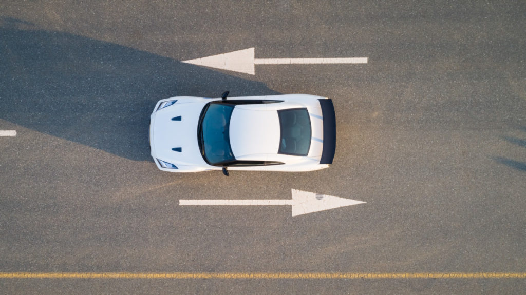 car, arrows. reversal, uncertain, direction, choice, street, road, bird's eye view, aerial image, drone photography, royalty free