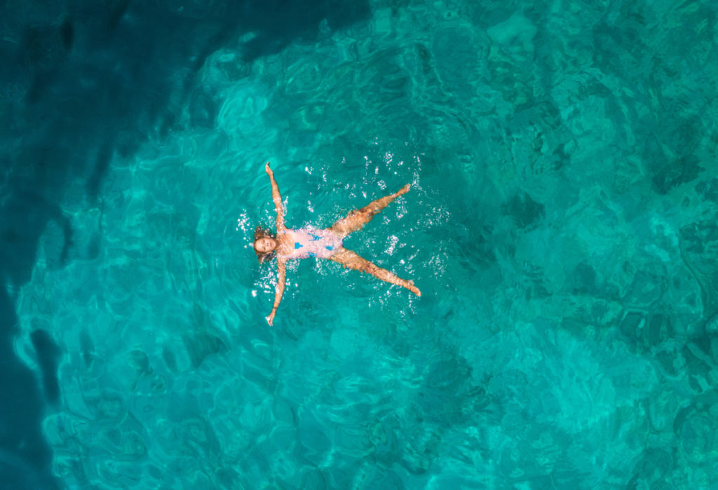 woman, sea, relaxing, sun, holiday, vacation, Model Release, bird's eye view, aerial image, drone photography, royalty free