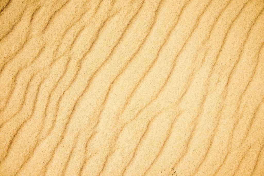 Sand wellenoberfläche textur material sand braun lizenzfrei bild foto