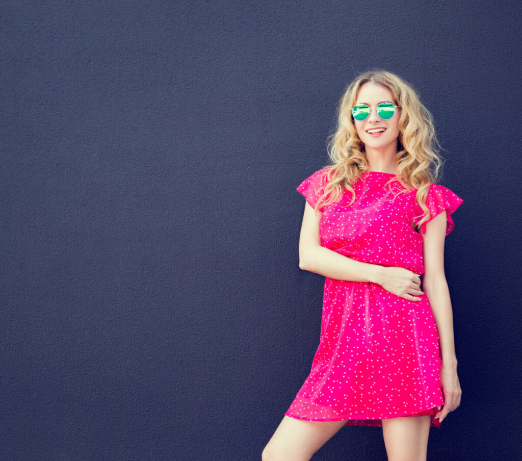 Fashionable pink dress sunglasses urban summer street style female copyspace royalty free stock photos panthermedia